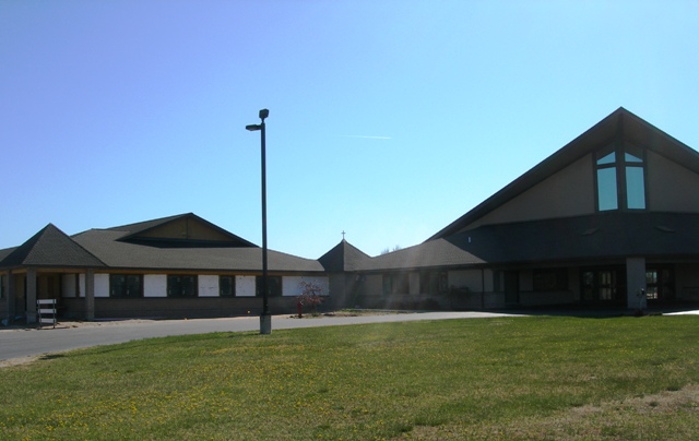 picture taken from front elevation, looking at existing Church Worship area and new Addition (Do you notice the sun rays shining down from a cloudless sky?  This photo was NOT manipulated in any way)