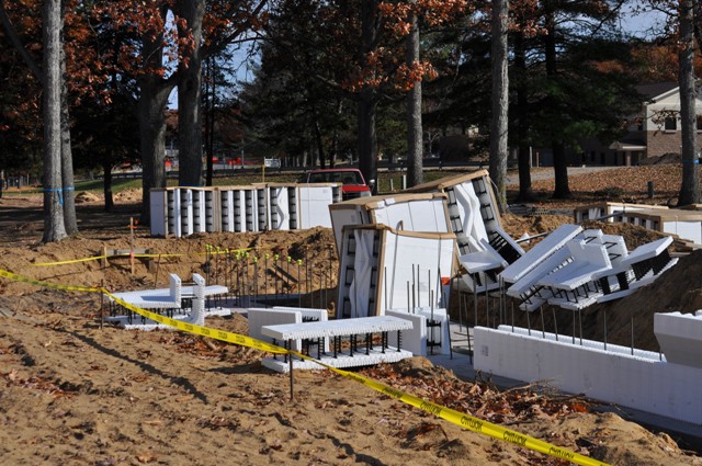 picture of ICF elements unloaded at the site ready for installation on poured foundation walls