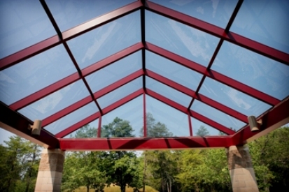 picture taken while standing under the entrance canopy at the Collins Center Training Facility at Alpena Combat Readiness Training Center - the canopy is metal and glass construction which allows plenty of natural light while offering protection from the elements