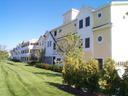 photo of Multi-Family Residential Development - Harborage Pointe Waterfront Condominiums in East Jordan, Michigan - this exterior photo shows the elevation that is visible from the road side of the development