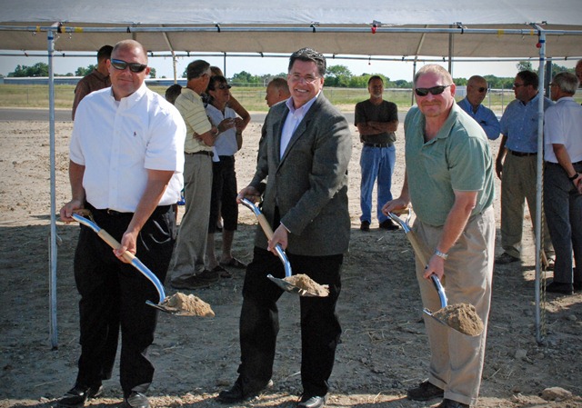 In the picture - Pat Frame (RS&H), Brad Butcher and Mark Johnson (Livingston County Airport) holding shovels at the groundbreaking ceremony