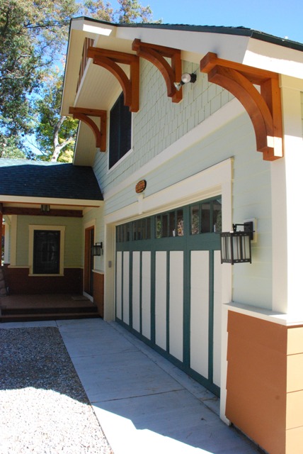 close up picture of custom garage and front door entry