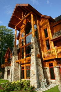 picture of lakeside main entrance timber and stone columns for waterfront home on Ward Lake in Gaylord, Michigan